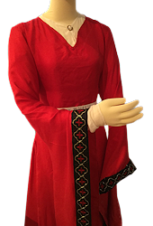 red silk dress on mannequin with one arm raised showing off the gold and red embroidery on a dark blue silk band